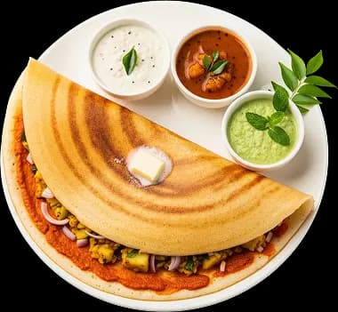 A delicious Masala Dosa served on a white plate with three different chutneys